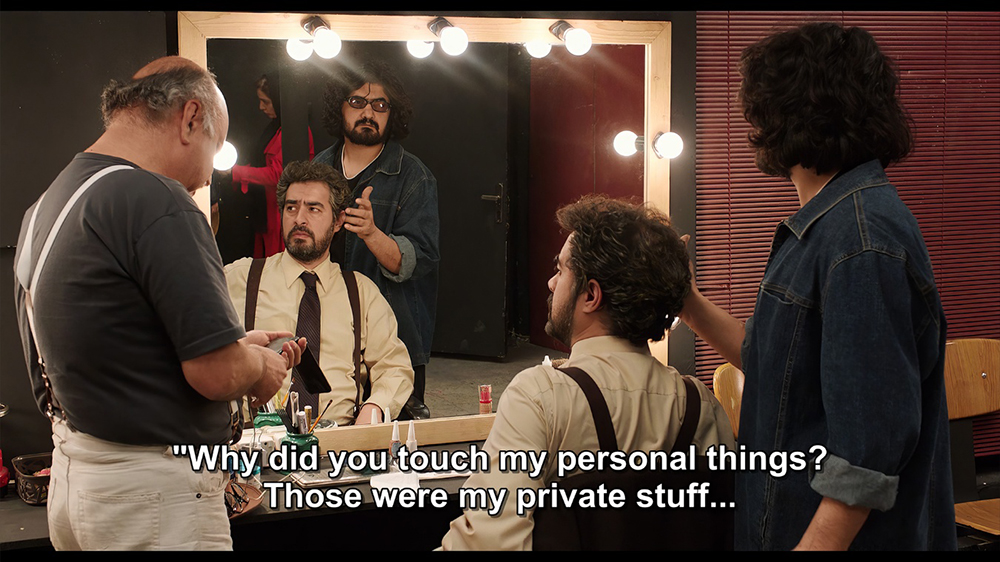 Dressing-room mirror as a contested boundary