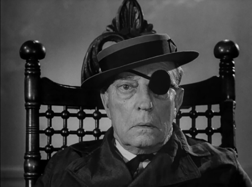 Buster Keaton as O displaying his iconic deadpan expression at the conclusion of Film.